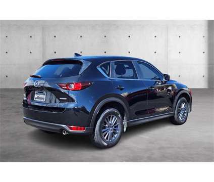 2021 Mazda CX-5 Touring Colorado Springs Near Pueblo is a Black 2021 Mazda CX-5 Touring SUV in Colorado Springs CO