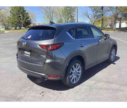 2021 Mazda CX-5 Grand Touring Reserve AWD is a Grey 2021 Mazda CX-5 Grand Touring SUV in Salt Lake City UT