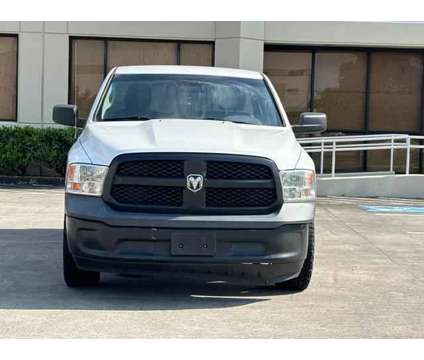 2018 Ram 1500 Quad Cab for sale is a White 2018 RAM 1500 Model Car for Sale in Houston TX