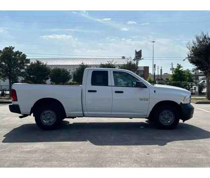 2018 Ram 1500 Quad Cab for sale is a White 2018 RAM 1500 Model Car for Sale in Houston TX