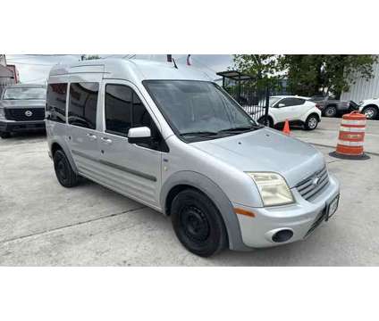 2013 Ford Transit Connect Passenger for sale is a White 2013 Ford Transit Connect Car for Sale in Houston TX