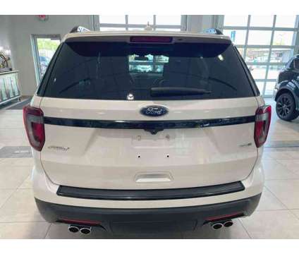 2018UsedFordUsedExplorerUsed4WD is a Silver, White 2018 Ford Explorer Car for Sale in Milwaukee WI
