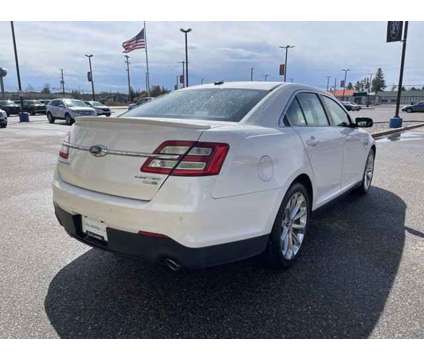 2016 Ford Taurus Limited is a White 2016 Ford Taurus Car for Sale in Traverse City MI