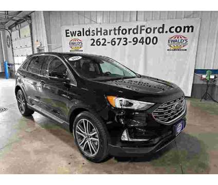 2021 Ford Edge Titanium is a Black 2021 Ford Edge Titanium SUV in Milwaukee WI