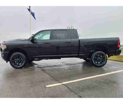 2024 Ram 2500 Laramie is a Black 2024 RAM 2500 Model Laramie Truck in Kansas City KS