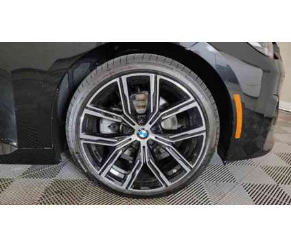 2024 BMW 2 Series 230i xDrive is a Black 2024 BMW 230 Model i Coupe in Milwaukee WI