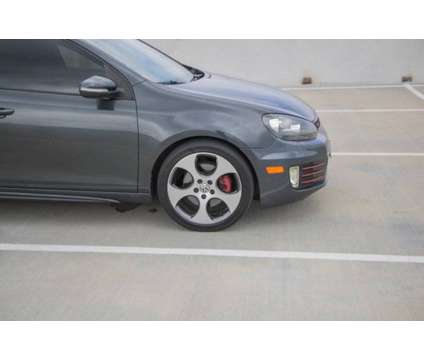 2011 Volkswagen GTI Base is a Grey 2011 Volkswagen GTI Car for Sale in Baytown TX