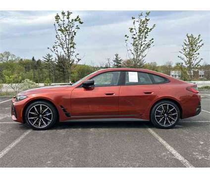 2023 BMW i4 eDrive40 is a Orange 2023 eDrive40 Car for Sale in Mars PA