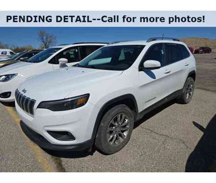 2021 Jeep Cherokee Latitude Lux is a White 2021 Jeep Cherokee Latitude SUV in Bay City MI