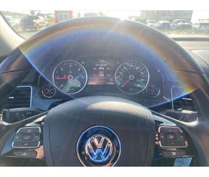 2014 Volkswagen Touareg TDI Sport is a Grey 2014 Volkswagen Touareg TDI Sport SUV in Havre MT