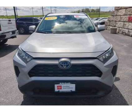 2021 Toyota RAV4 LE Hybrid is a Silver 2021 Toyota RAV4 LE Hybrid in Dubuque IA