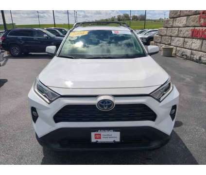 2021 Toyota RAV4 XLE Hybrid is a White 2021 Toyota RAV4 XLE Hybrid in Dubuque IA