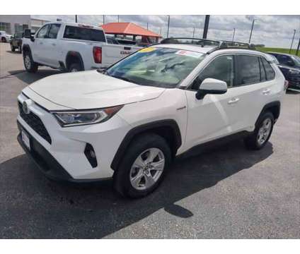 2021 Toyota RAV4 XLE Hybrid is a White 2021 Toyota RAV4 XLE Hybrid in Dubuque IA