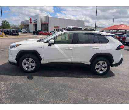 2021 Toyota RAV4 XLE Hybrid is a White 2021 Toyota RAV4 XLE Hybrid in Dubuque IA