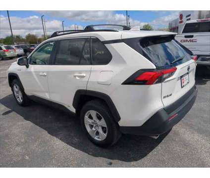 2021 Toyota RAV4 XLE Hybrid is a White 2021 Toyota RAV4 XLE Hybrid in Dubuque IA