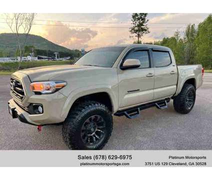 2017 Toyota Tacoma Double Cab for sale is a Tan 2017 Toyota Tacoma Double Cab Car for Sale in Cleveland GA