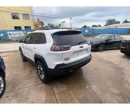 2019 Jeep Cherokee for sale is a White 2019 Jeep Cherokee Car for Sale in Houston TX