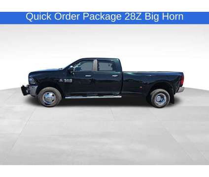 2018UsedRamUsed3500Used4x4 Crew Cab 8 Box is a Black, Green 2018 RAM 3500 Model Car for Sale in Decatur AL