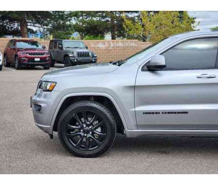2017 Jeep Grand Cherokee Altitude is a Silver 2017 Jeep grand cherokee Altitude Car for Sale in Denver CO