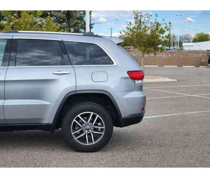 2021 Jeep Grand Cherokee Limited is a Silver 2021 Jeep grand cherokee Limited Car for Sale in Denver CO