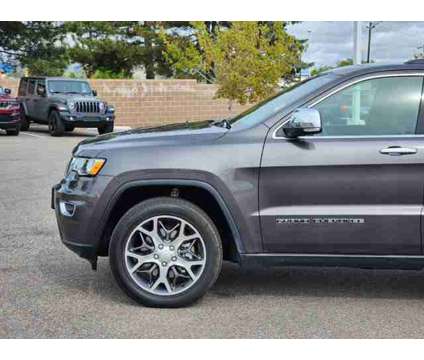 2021 Jeep Grand Cherokee Limited is a Grey 2021 Jeep grand cherokee Limited Car for Sale in Denver CO