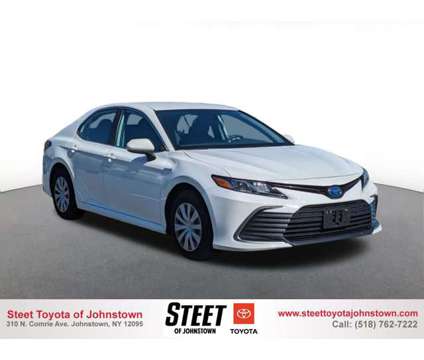2021 Toyota Camry Hybrid LE is a White 2021 Toyota Camry Hybrid in Johnstown NY