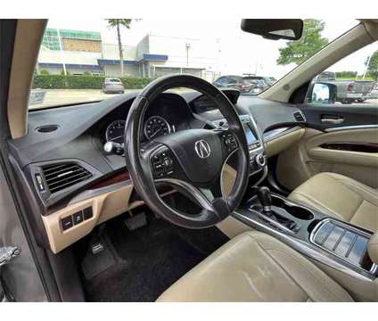 2014 Acura MDX 3.5L Technology Package SH-AWD is a Grey 2014 Acura MDX 3.5L Technology Package SUV in Houston TX