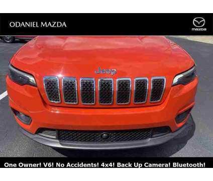 2021 Jeep Cherokee Latitude Lux is a Orange 2021 Jeep Cherokee Latitude SUV in Fort Wayne IN