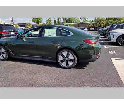 2024 BMW i4 eDrive35 is a Green 2024 Sedan in Jacksonville FL