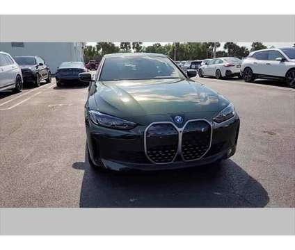 2024 BMW i4 eDrive35 is a Green 2024 Sedan in Jacksonville FL