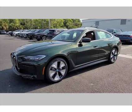 2024 BMW i4 eDrive35 is a Green 2024 Sedan in Jacksonville FL