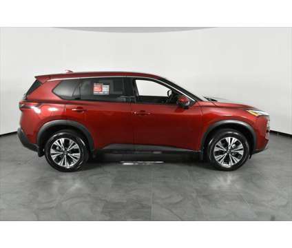 2021 Nissan Rogue SV FWD is a Red 2021 Nissan Rogue SV Station Wagon in Orlando FL