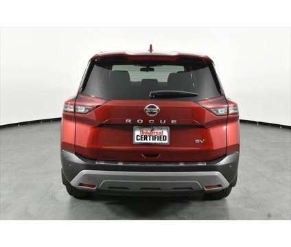 2021 Nissan Rogue SV FWD is a Red 2021 Nissan Rogue SV Station Wagon in Orlando FL