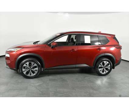 2021 Nissan Rogue SV FWD is a Red 2021 Nissan Rogue SV Station Wagon in Orlando FL