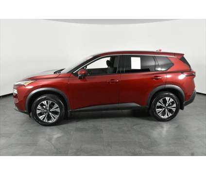 2021 Nissan Rogue SV FWD is a Red 2021 Nissan Rogue SV Station Wagon in Orlando FL