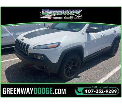 2017 Jeep Cherokee Trailhawk is a White 2017 Jeep Cherokee Trailhawk Car for Sale in Orlando FL