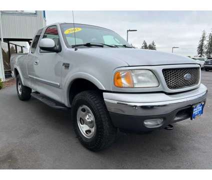 2003 Ford F-150 XLT is a Silver 2003 Ford F-150 XLT Car for Sale in Mcminnville OR