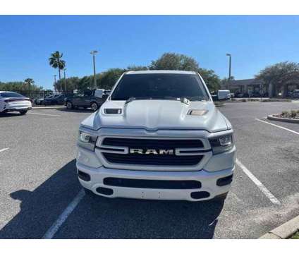 2021 Ram 1500 Laramie is a White 2021 RAM 1500 Model Laramie Car for Sale in Orlando FL