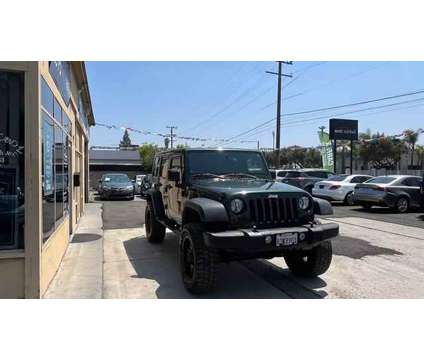 2010 Jeep Wrangler for sale is a Green 2010 Jeep Wrangler Car for Sale in Fullerton CA