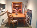 Practically new dinning set with 4 high back chairs in excellent condition