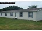 Country 4 bedroom 2 1/2 bath 2128 Sq ft home with a 2 bedroom 2 bath trailer on