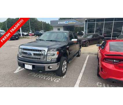 2014 Ford F-150 XLT is a Black 2014 Ford F-150 XLT Truck in Wake Forest NC