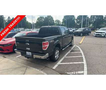 2014 Ford F-150 XLT is a Black 2014 Ford F-150 XLT Truck in Wake Forest NC