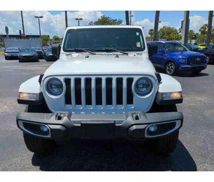 2018 Jeep Wrangler Unlimited Sahara is a White 2018 Jeep Wrangler Unlimited Sahara SUV in Daytona Beach FL