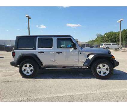 2018 Jeep Wrangler Unlimited Sport S is a Silver 2018 Jeep Wrangler Unlimited Car for Sale in Orlando FL