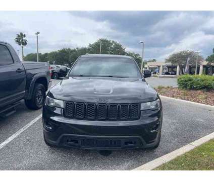 2019 Jeep Grand Cherokee Upland Edition is a Black 2019 Jeep grand cherokee Upland Car for Sale in Orlando FL