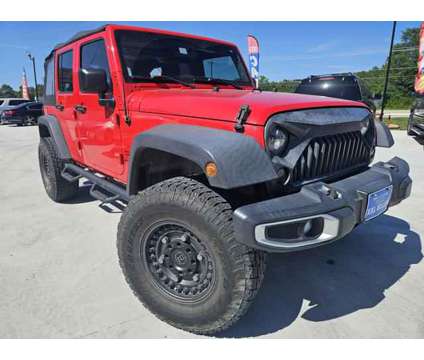 2017 Jeep Wrangler Unlimited for sale is a Red 2017 Jeep Wrangler Unlimited Car for Sale in Porter TX