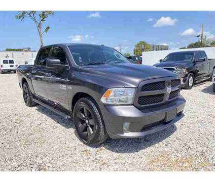 2016 Ram 1500 Crew Cab for sale is a Grey 2016 RAM 1500 Model Car for Sale in Tampa FL