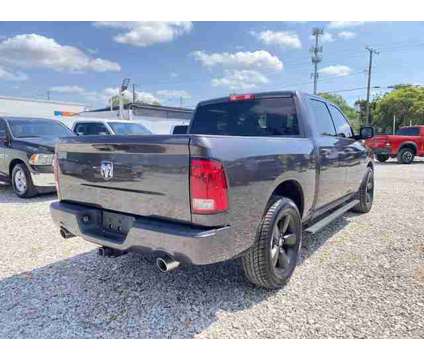 2016 Ram 1500 Crew Cab for sale is a Grey 2016 RAM 1500 Model Car for Sale in Tampa FL