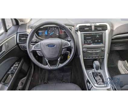 2015 Ford Fusion for sale is a Silver 2015 Ford Fusion Car for Sale in Mission KS